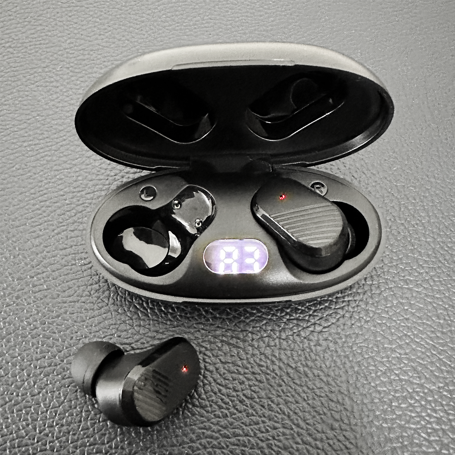 Woman wearing EchoLabs earbud outdoors