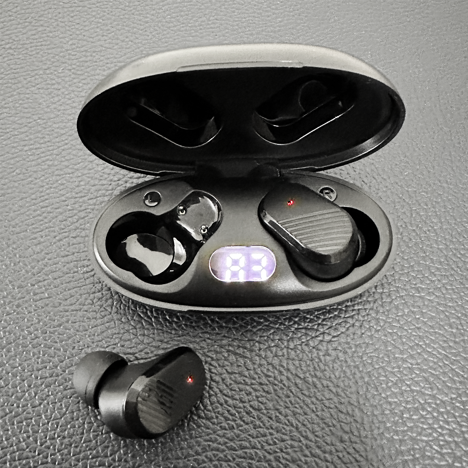 Woman wearing EchoLabs earbud outdoors