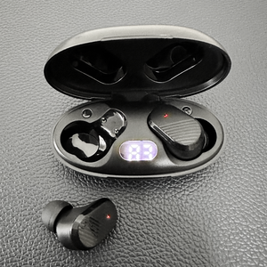 Woman wearing EchoLabs earbud outdoors